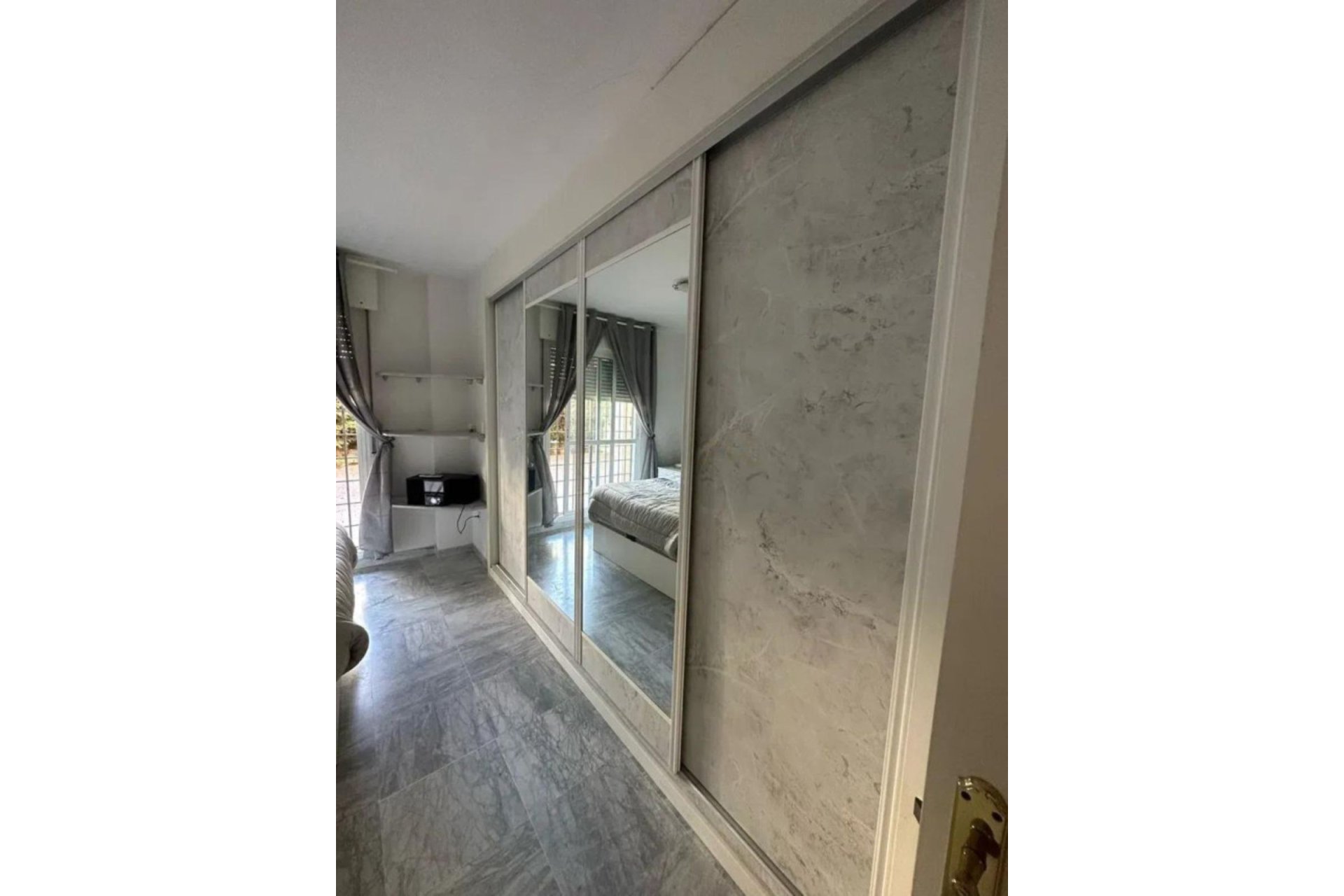 Resale - Ground floor apartment - Marbella - Nueva Andalucia